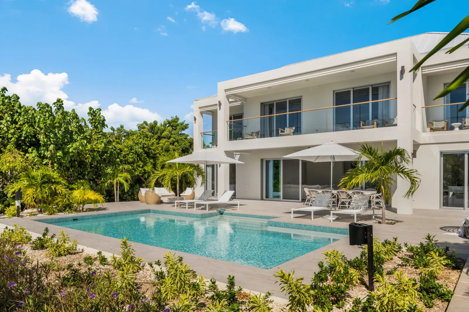 Private pool and tropical garden at a Caicos Exclusive villa